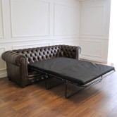 Pikowana sofa chesterfield z funkcją spania skóra