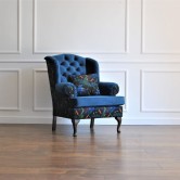 Pikowany fotel uszak chesterfield