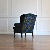 Pikowany fotel uszak chesterfield