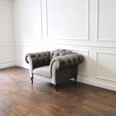 Pikowany fotel chesterfield Kremona